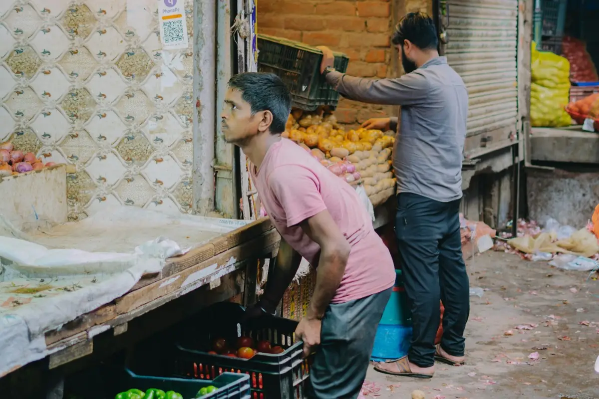 A market stall being restocked