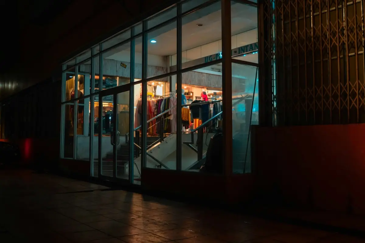 A lit shopfront after dark